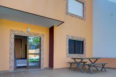 a room with a table and a window at Choromar Apartments in Albufeira