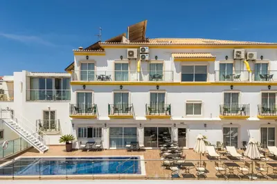 a view of a beach and the ocean at Vila Sao Vicente Boutique (Adults Only) in Albufeira