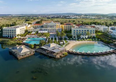 an aerial view of a resort on the water at Domes Lake Algarve, Autograph Collection in Vilamoura