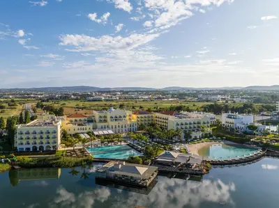 an aerial view of a resort on the water at Domes Lake Algarve, Autograph Collection in Vilamoura