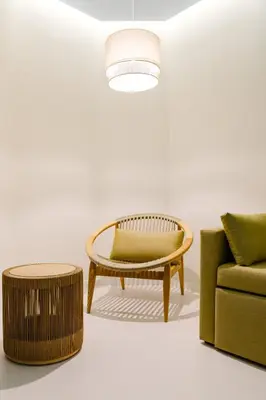 a table with two drinks on a balcony with a view at Hotel Indigo Albufeira by IHG in Albufeira