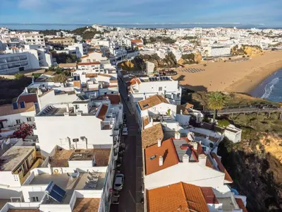 an aerial view of a city with a beach at Casa Mar d'Alma - 100m from the Beach in Albufeira
