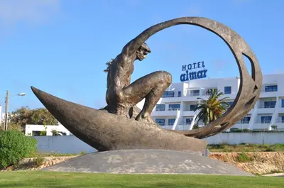 a statue in front of the hotel buffet at Almar Hotel Apartamento in Albufeira