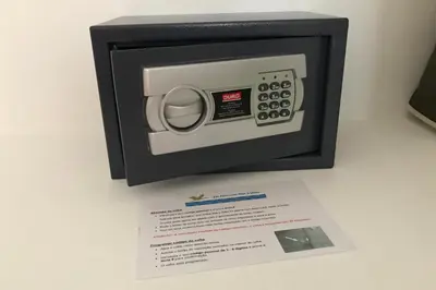 a microwave oven sitting on top of a paper at In Faro with Sea View in Faro