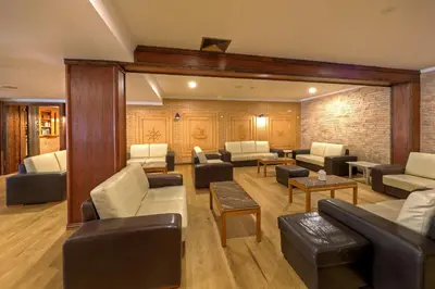 a lobby of a pharmacy with a counter at Aparthotel Paladim & Alagoamar in Albufeira