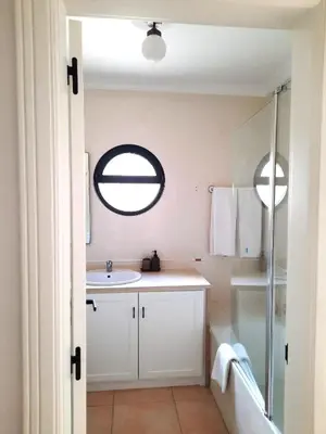 a bathroom with a sink and a mirror at Eden Vilage by Garvetur in Vilamoura
