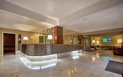 a lobby of a hotel with a reception desk at Turial Old Town Ocean View in Albufeira