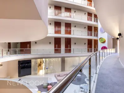 a view from the stairs of a building at Aqua Pedra Dos Bicos Design Beach Hotel - Adults Friendly in Albufeira