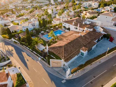 an aerial view of a house with a swimming pool at Cerro Da Marina Hotel - Adults Only in Albufeira