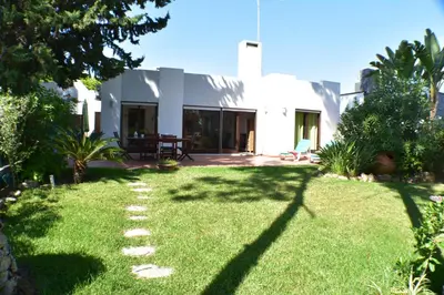 a garden with a pathway in front of a house at Villa Alexia - By Algarkasa in Albufeira