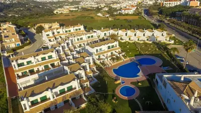 an aerial view of a city with white houses at São Rafael Beach Villa- D´alma Rafaella in Albufeira
