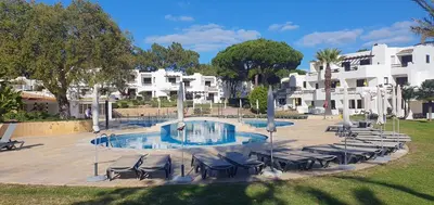 an aerial view of the ocean and a beach at Apt P209 situé au sein de Balaia Golf Village in Albufeira