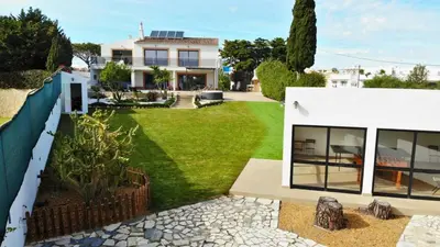 a view of a house with a yard at Villa Margarida by Laranjal Rentals in Albufeira