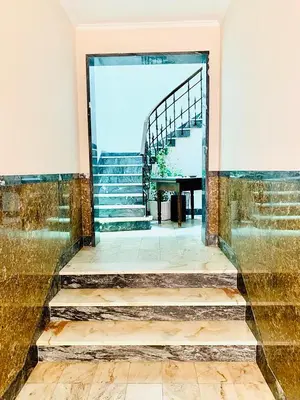 a staircase in a building with a stair case at Senhor Gigi in Faro
