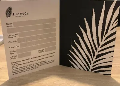 a box with a card on a table at Alameda Exclusive House in Faro
