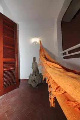 a room with a bed with a net on the wall at MAIN AVENUE ALBUFEIRA, walk to beach, Old Town, shooping, top location in Albufeira