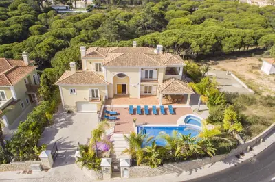 an aerial view of a house with a swimming pool at Villa Valentina in Almancil