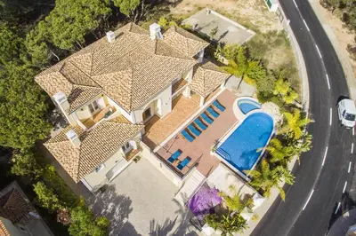 an overhead view of a house with a swimming pool at Villa Valentina in Almancil