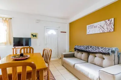 a living room with a couch and a table at ★Traditional House★Heart of Oldtown★ Amazing views in Albufeira