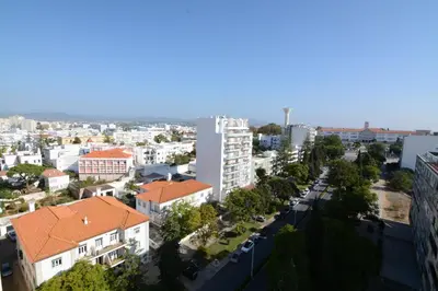 an aerial view of a city with buildings at Wonderful view in the city center in Faro
