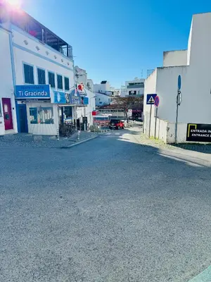 an empty street in a town with a building at Apartment Old Town Telheiros in Albufeira