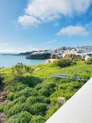 a view of the ocean from a house at Apartment Old Town Telheiros in Albufeira
