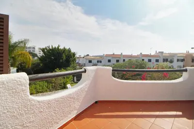 a bedroom with a bed and a couch at Villa 3 Quartos, Piscina, BBQ, Jardim, Prestige For Home in Vilamoura