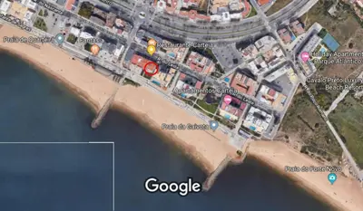 a map of a beach next to the water at Apartment Sea View 20m to beach - TOP Quarteira ALGARVE in Quarteira