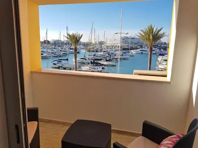 a view of a marina from a window at Marina Plaza 162 - Clever Details in Vilamoura