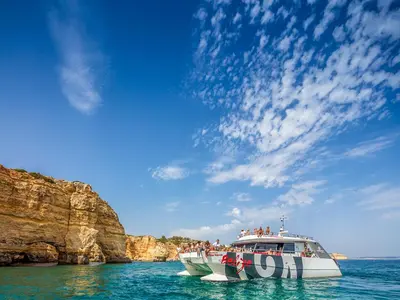 a group of people on a boat in the water at V3, Villa Jardins Branqueira6 near Beach, Albufeira in Albufeira