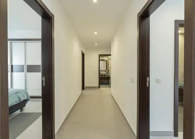 a hallway leading to the bedroom in a house at VERASOL 3 in Albufeira