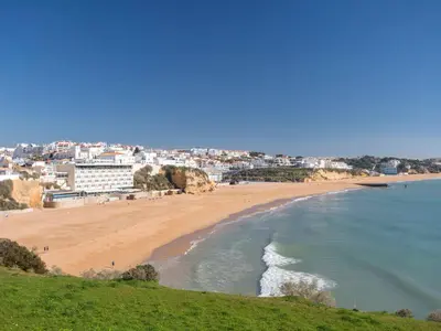 a view of a beach with a city in the background at Apartment Monte da Eira by Interhome in Brejos