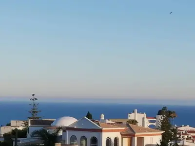 a view of a city with the ocean in the background at Sea View 3 in Albufeira