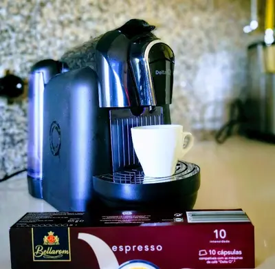 a coffee maker and a cup on a table at Spacious apartment in Albufeira with pool and terrace in Albufeira