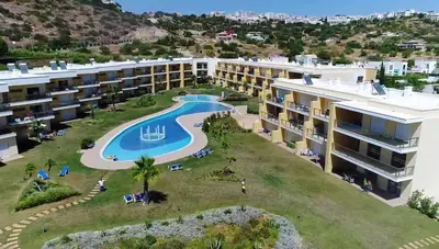 an aerial view of a resort with a swimming pool at Spacious apartment in Albufeira with pool and terrace in Albufeira