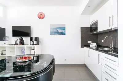 a bowl of fruit on a table in a kitchen at SUITEON7TH VILAMOURA THE BEST VIEW IN TOWN - 1Br in Quarteira