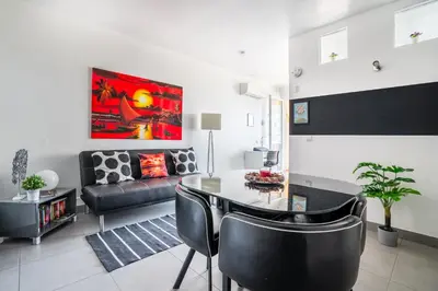 a bedroom with a bed with pillows on it at SUITEON7TH VILAMOURA THE BEST VIEW IN TOWN - 1Br in Quarteira