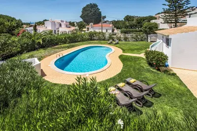 an image of a swimming pool in a yard at Villa Severino in Albufeira