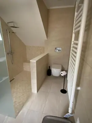 a bathroom with a shower and a toilet at casa da ainheira 44 cruz da assumada 8100-296 Loulé in Loulé
