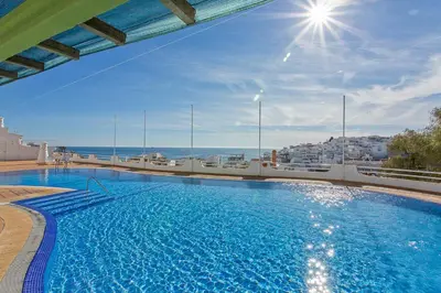 a large swimming pool on top of a building at AZUL/MAR ALBUFEIRA 602 in Albufeira
