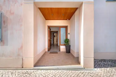 a hallway of a building with a wooden ceiling at Villa Ruana - 5 bedrooms on Suite- Free out door Hot Jacuzzi - By Bedzy in Albufeira