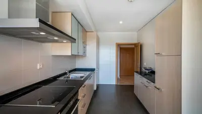 a kitchen with a sink and a stove at Marina Vilamoura - Aquamar 120 - By Vilamoura Sun in Vilamoura