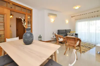 a room with a dresser and a mirror at Galé Mar by OCvillas in Galé