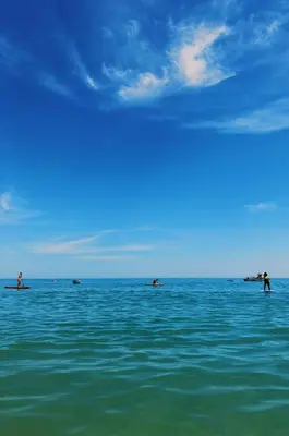a group of people in the water on boats at Casa dos Avós by MTPhomes in Albufeira