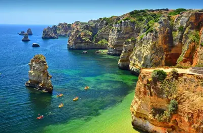 an aerial view of a cove with rocks in the water at Apartment MargemSul - Pool - Beach - Free Wifi - Air Con in Albufeira