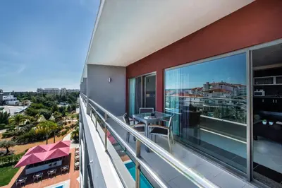 arial view of a city from a building at Areias Village Beach Suite Hotel in Albufeira