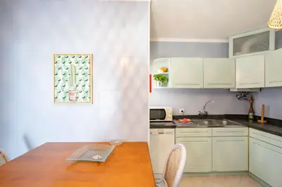 a bathroom with a tub and a toilet and a sink at Bem Parece by Umbral in Albufeira