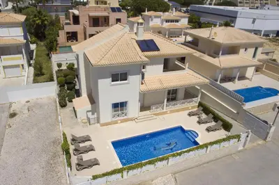 an aerial view of a house with a swimming pool at Villa Maresia in Galé