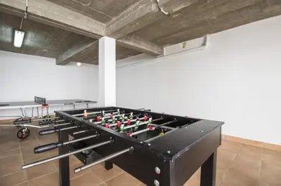 a pool table in a room with a ceiling at Villa Maresia in Galé