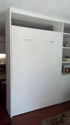 a white closet with two doors in a room at Casal das Alfarrobeiras, 7 in Vilamoura